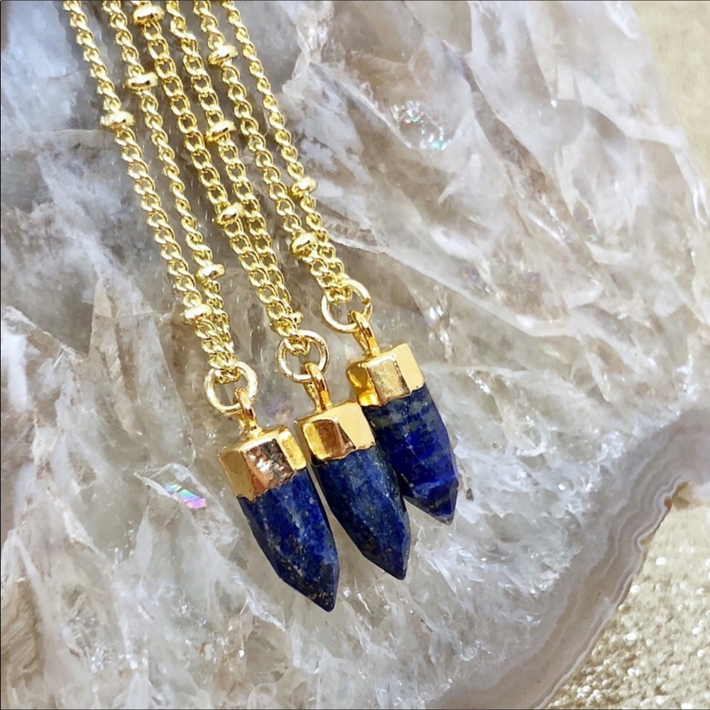SOLD OUT.  The Lapis stone brings good luck and fortune comes with brilliant gol